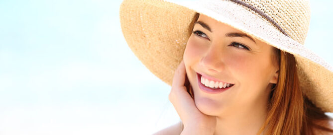 Beauty woman with white teeth smile looking sideways